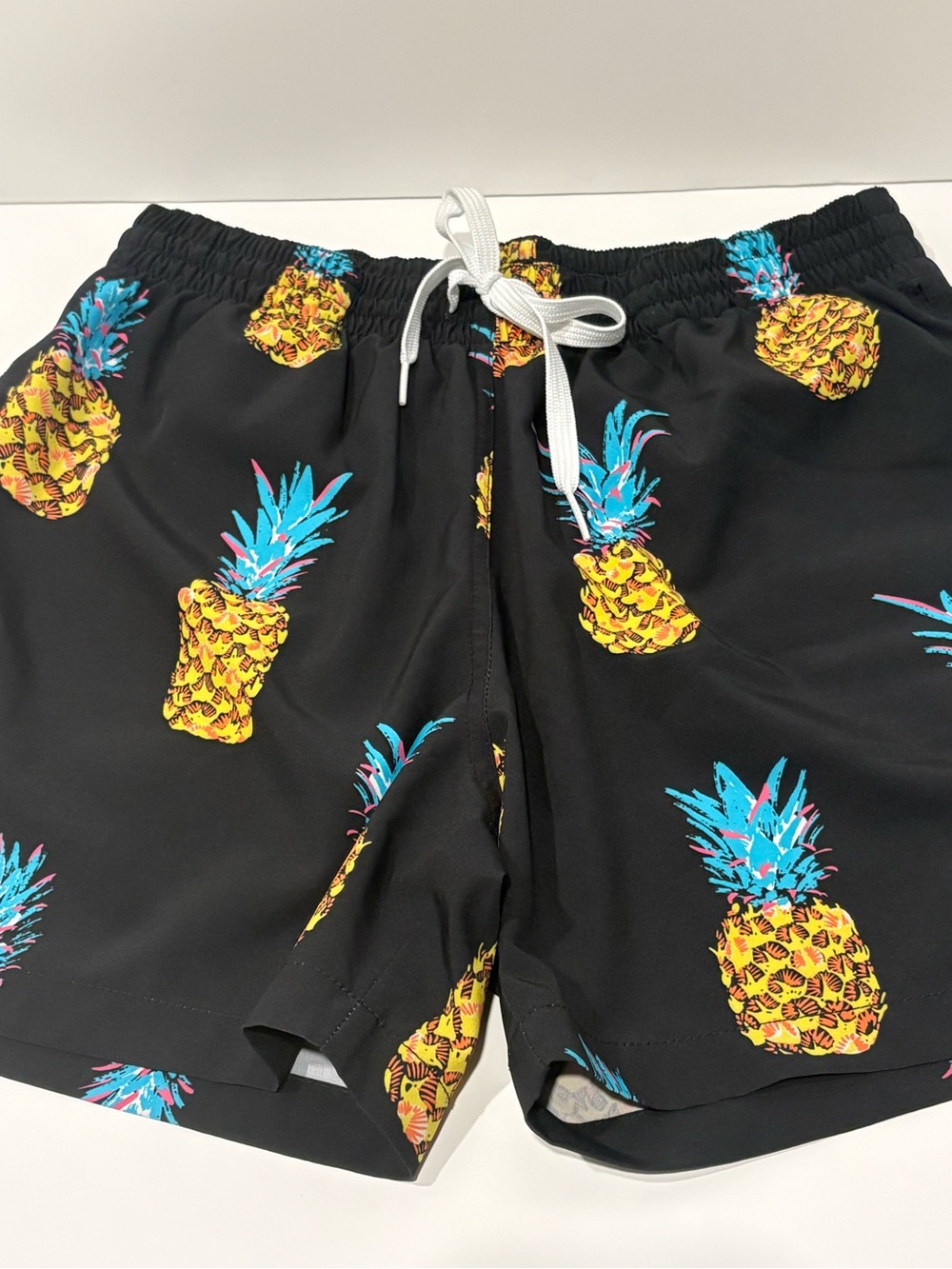 Chubbies Black Swim Trunks with Yellow & Teal Pineapple Print